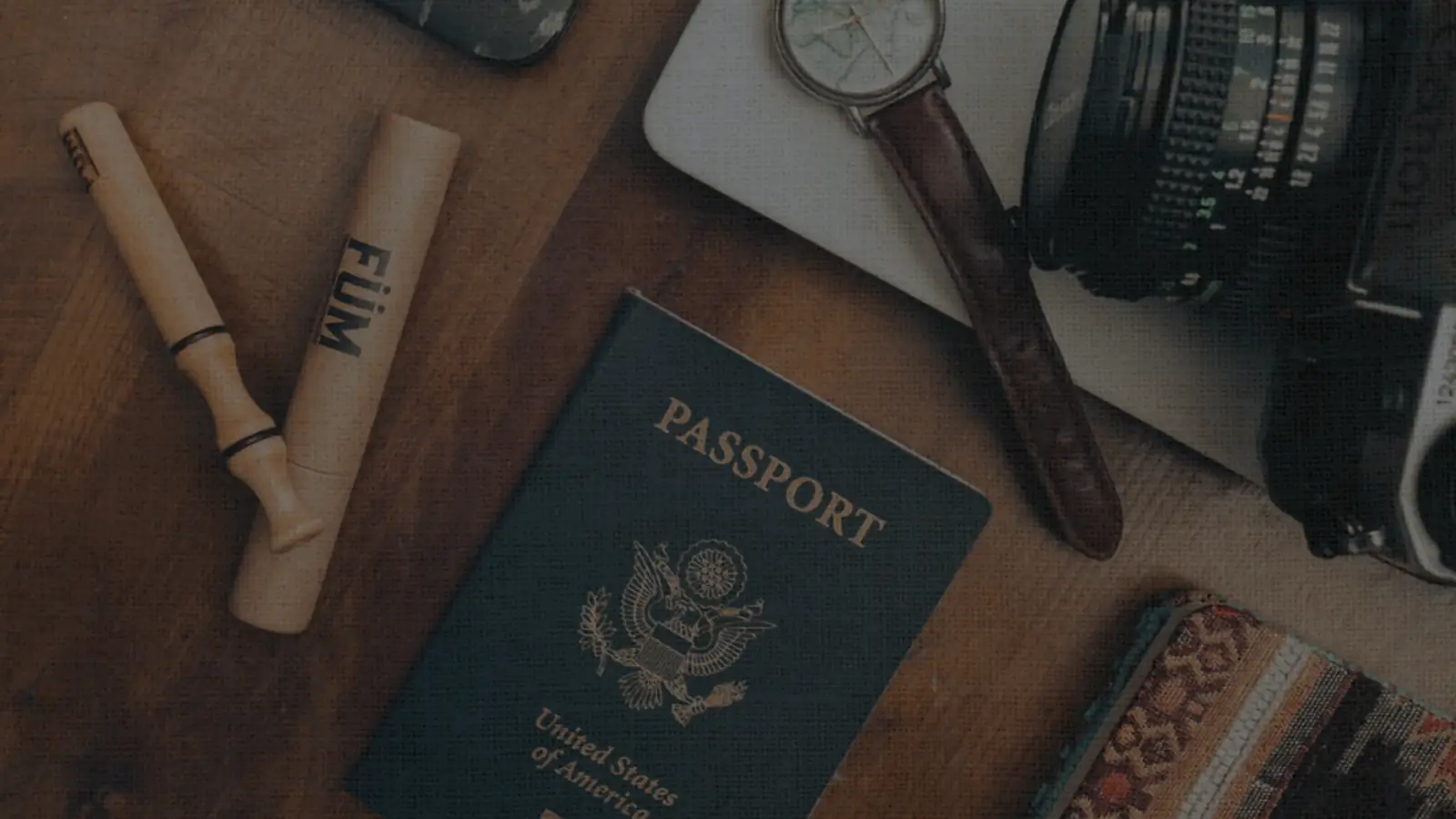 Passport and travel documents on a desk